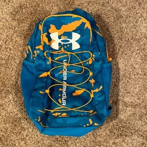 Under Armour blue/orange camo backpack. Like new